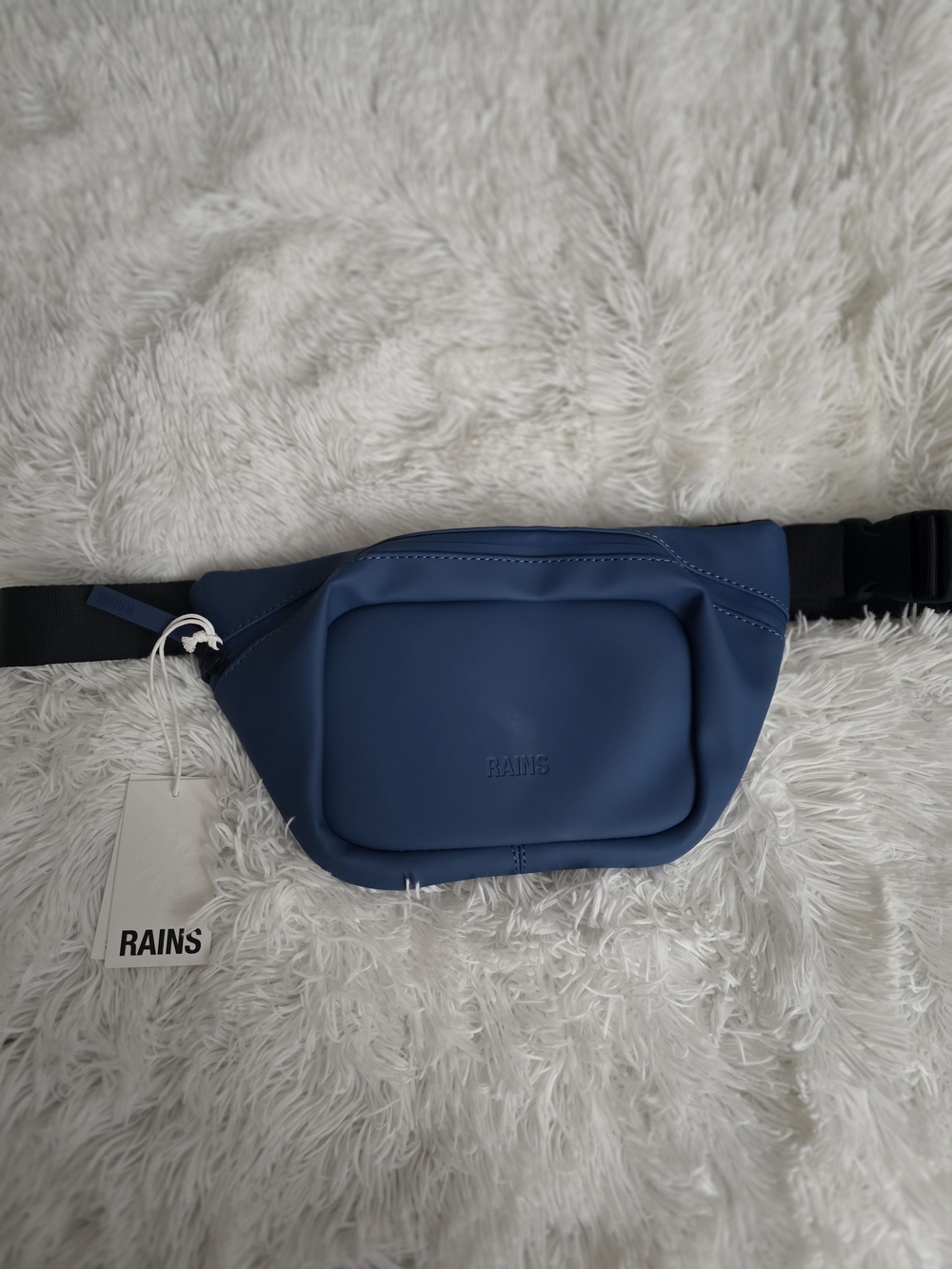 Rains navy blue waterproof belt bag with black strap